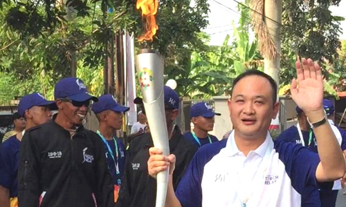 助力18届亚运会, jxf吉祥坊董事长赵密升在印尼传递亚运圣火!